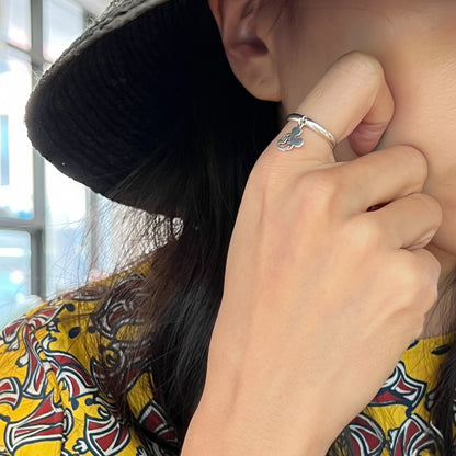 925 sterling silver Mickey Mouse charm dangle ring worn on finger showing heavy weight solid band with character detail