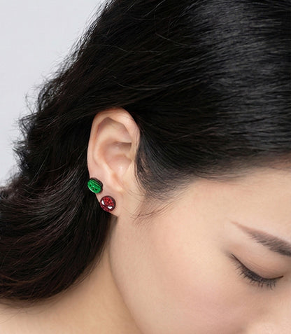 Spider-Man and Hulk Marvel earrings worn on lobe, handmade brass character studs with detailed enamel paint