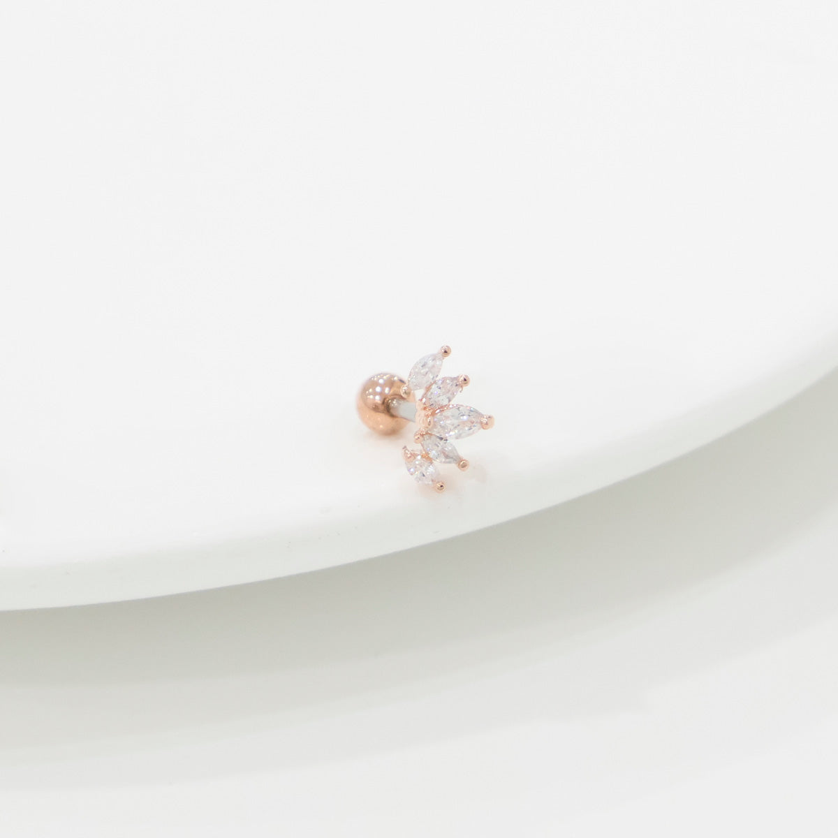 Rose gold wing earring with surgical steel post and marquise cubic zirconia stones