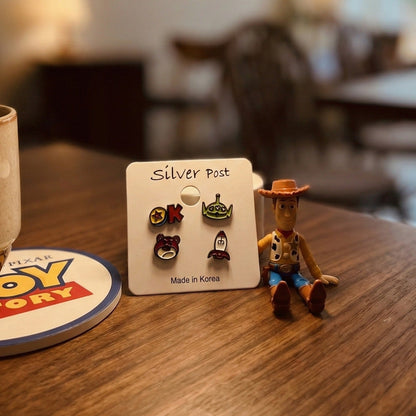 Toy Story inspired enamel stud earring set featuring Lotso, Alien, Rocket and Pixar Ball with silver posts