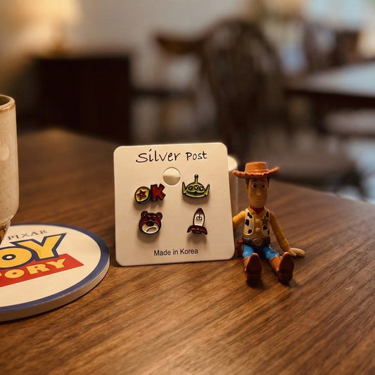 Toy Story inspired enamel stud earring set featuring Lotso, Alien, Rocket and Pixar Ball with silver posts