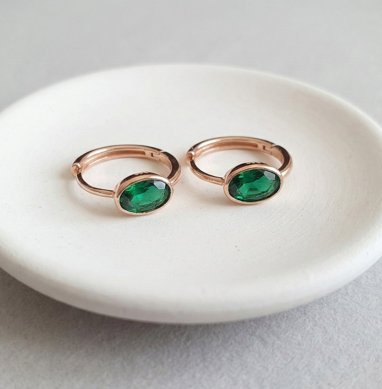 Oval Bezel CZ Huggie Earrings in Rose Gold — 3 Colors