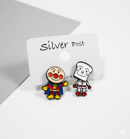 Anpanman and Shokupanman stud earrings on display card