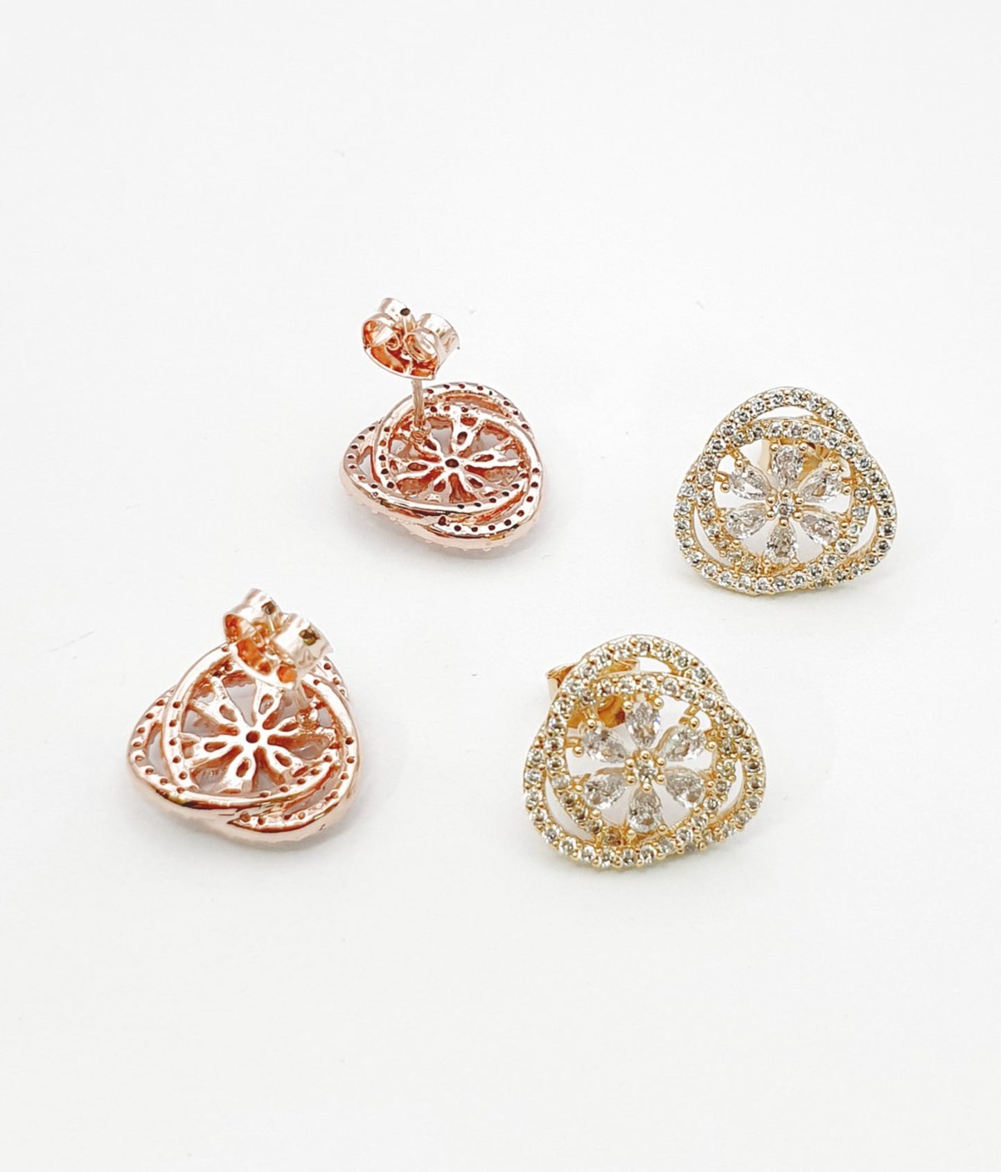 Heart-shaped CZ stud earrings in rose gold and yellow gold on white background showing front and back detail, 925 silver posts, Korean made

