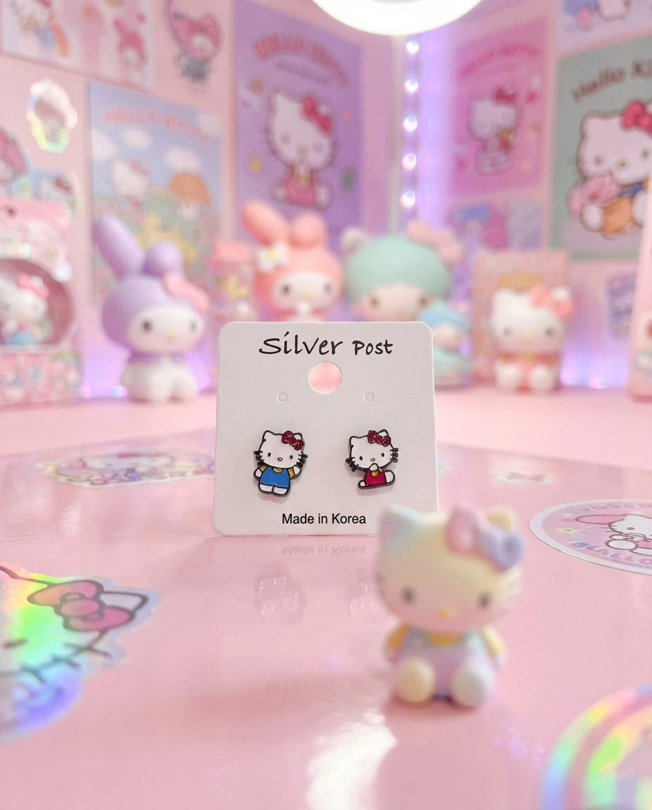 Product display of Hello Kitty stud earrings on white card with kawaii pastel background and collectibles
