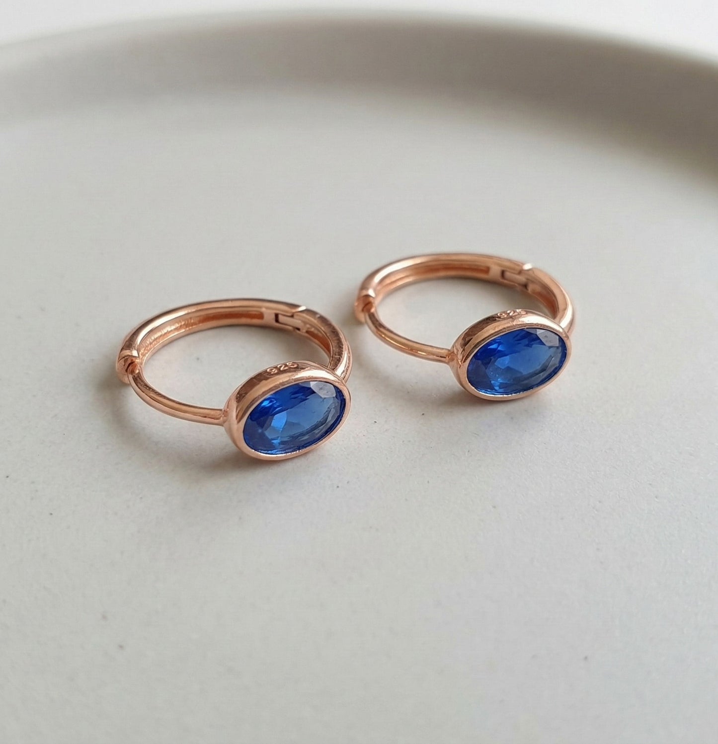 Oval Bezel CZ Huggie Earrings in Rose Gold — 3 Colors