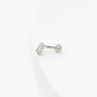 Single rectangular clear CZ barbell earring in a silver setting, placed on a white display.