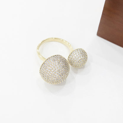 Gold double ball open ring with full micro pave setting, shown on clean white background