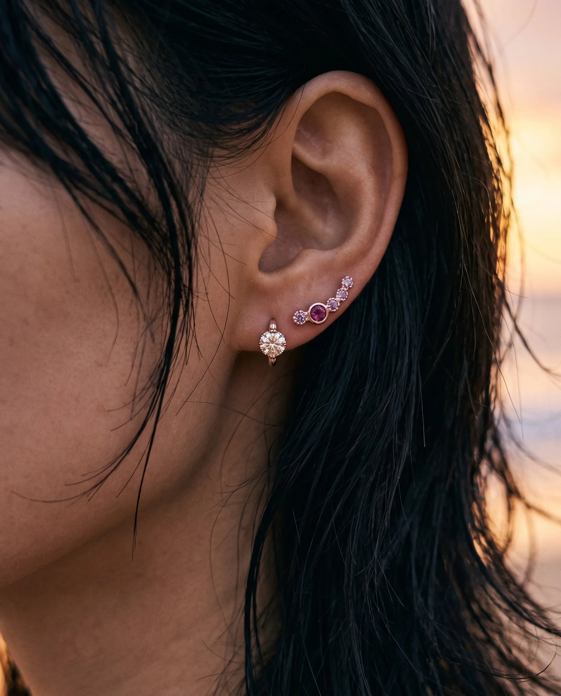 Curated ear piercing look with amethyst ruby bezel ear climber, rose gold 925 silver, evening date night aesthetic