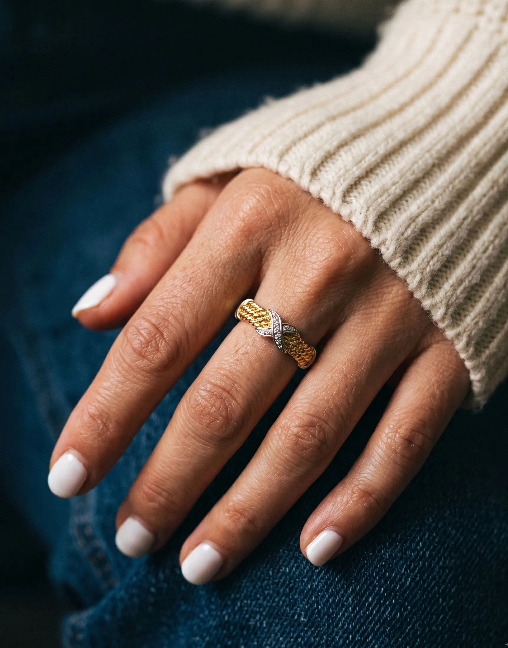 Curated ring stack aesthetic on denim, 925 silver X cubic ring for everyday layering.