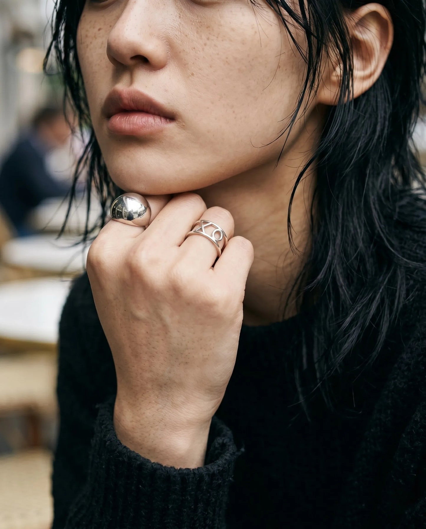 K-fashion layered ring inspo 8ttitto8 dome ring with XO wide band, shag cut grunge aesthetic street style look.