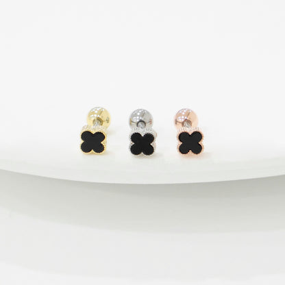 Four leaf clover mother of pearl piercing in black with gold silver rose gold titanium post on white background
