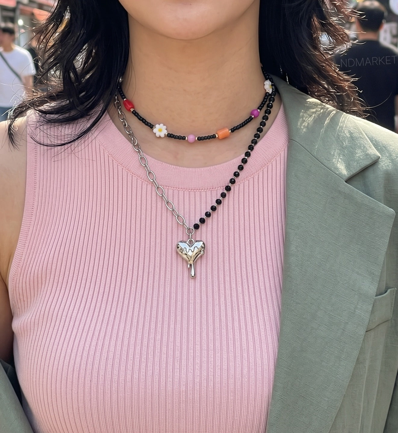Korean street style melting heart necklace asymmetric bead chain pendant, oversized khaki blazer pink tank off-duty look