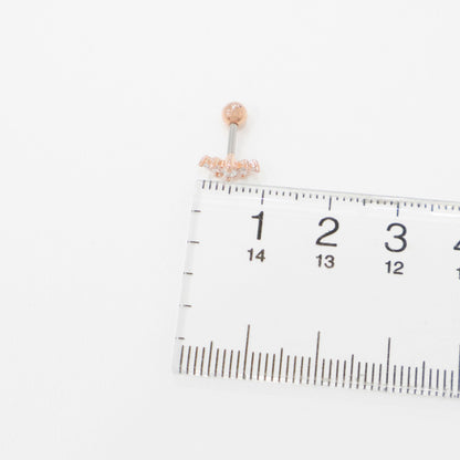 Size comparison of wing marquise cubic stud with ruler showing 8mm decoration length