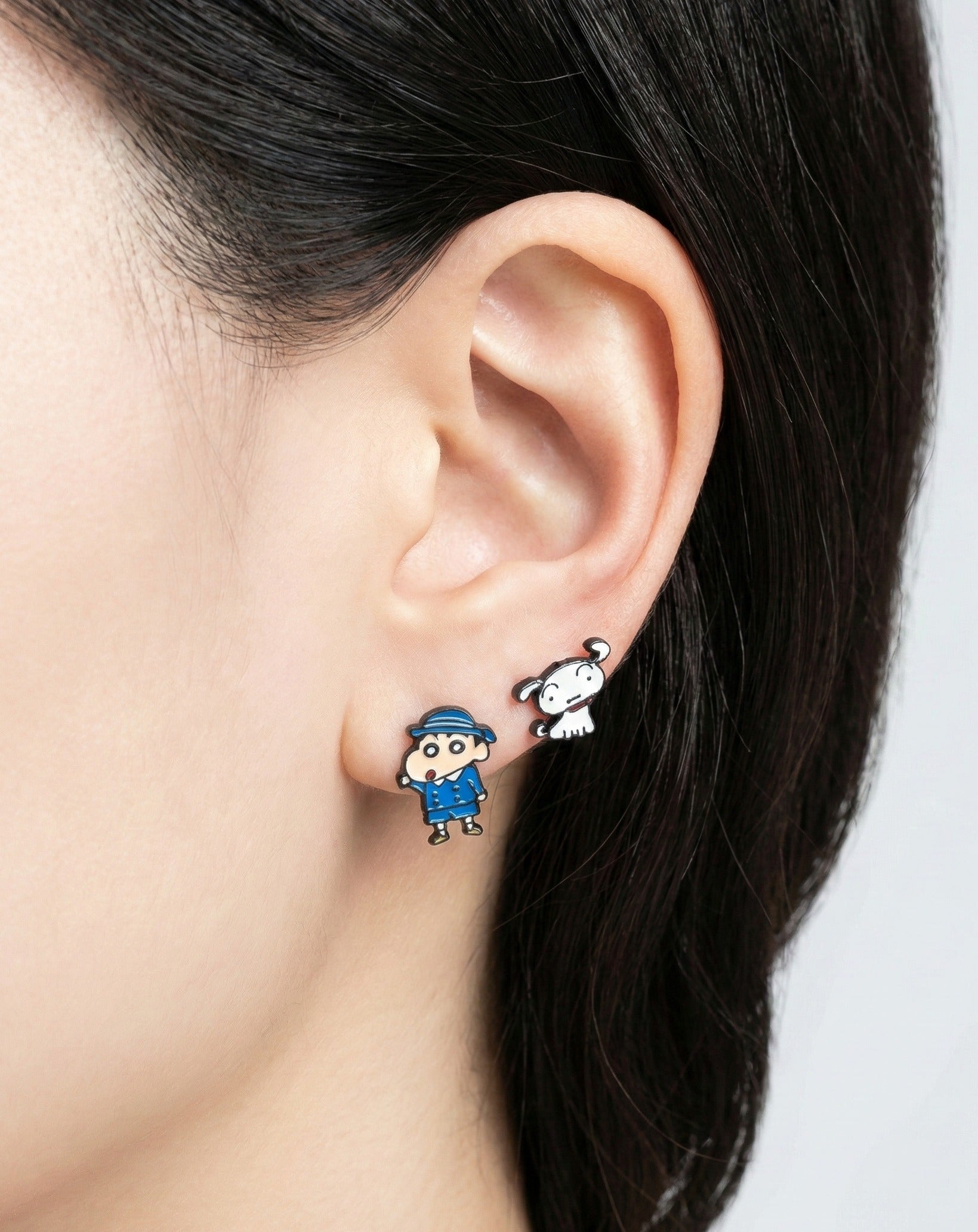  Model wearing Shin-chan school uniform and Shiro asymmetrical earrings showing comfortable fit on earlobe
