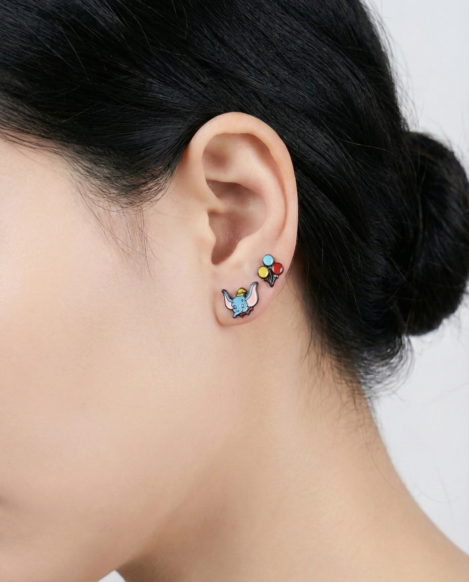 Flying elephant stud earring with colorful balloons