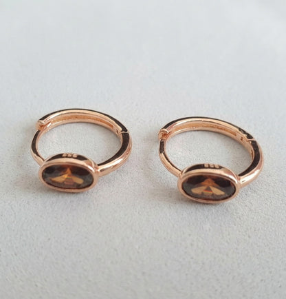 Oval Bezel CZ Huggie Earrings in Rose Gold — 3 Colors
