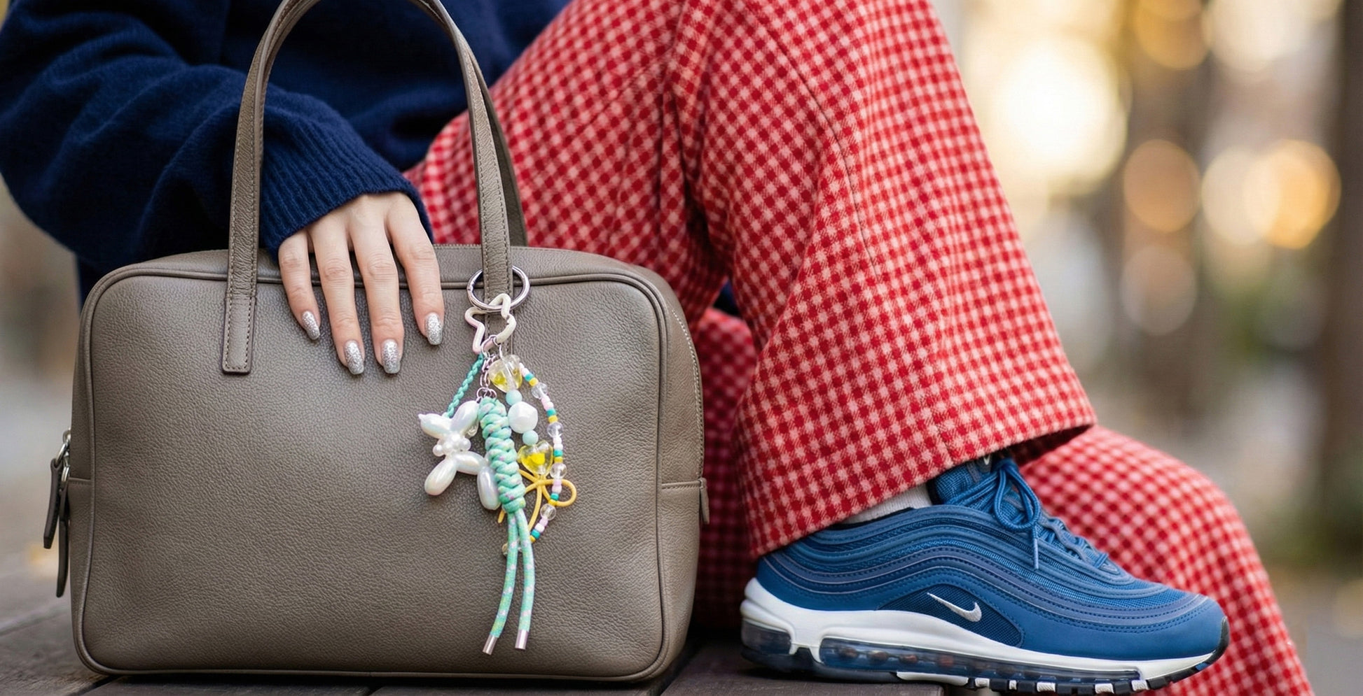 Mint green white balloon dog keychain close-up with crystal beads and yellow bow