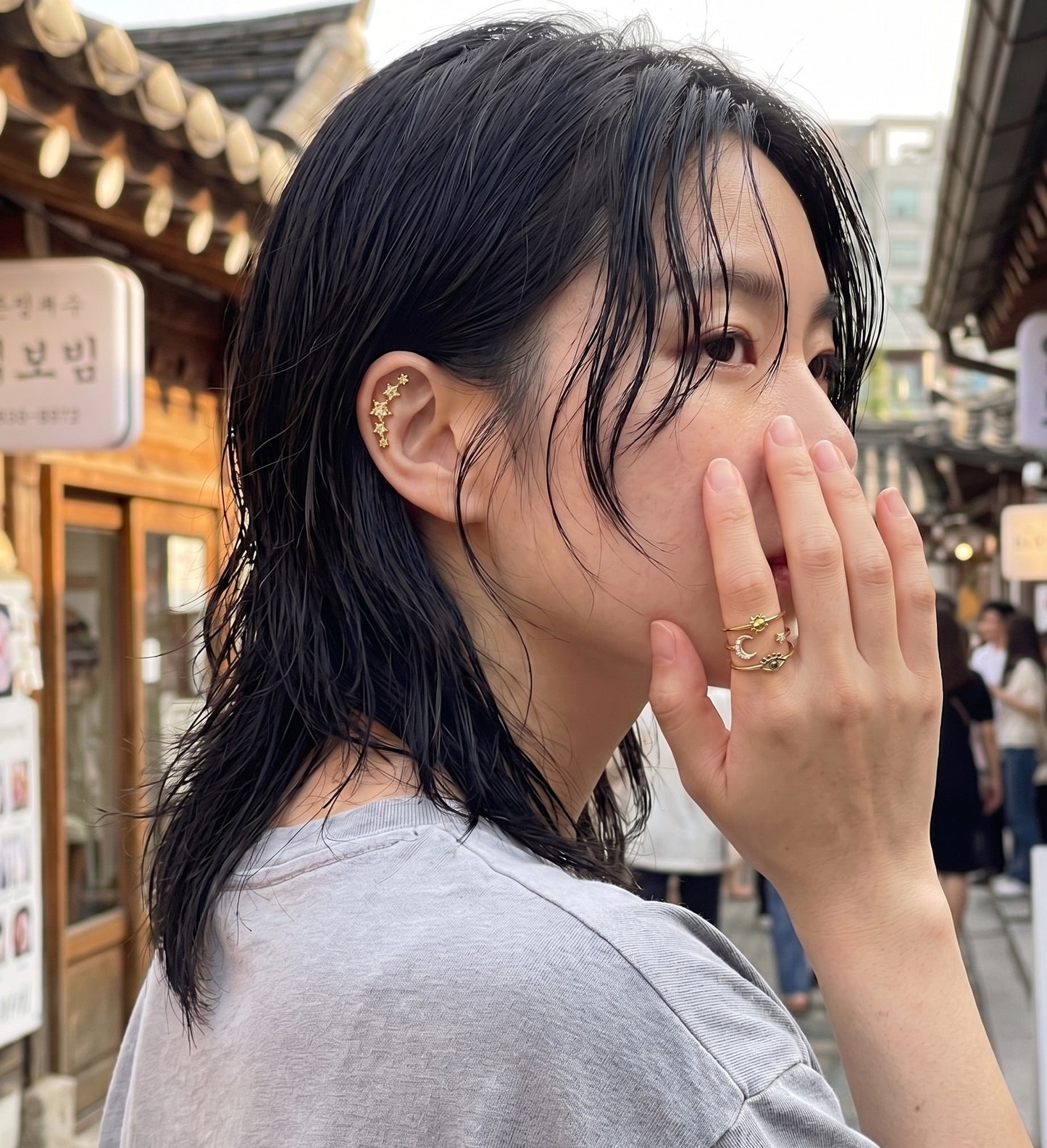  Hanok village K-style gold celestial layered ring with star ear climber piercing, spiritual protection ring street snap Seoul.