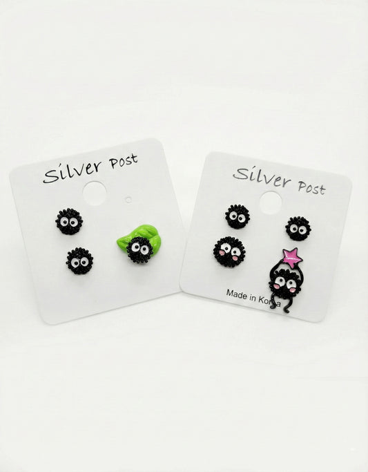 Two earring cards side by side showing complete set of 4 Soot Sprites including leaf and star candy versions with Made in Korea label