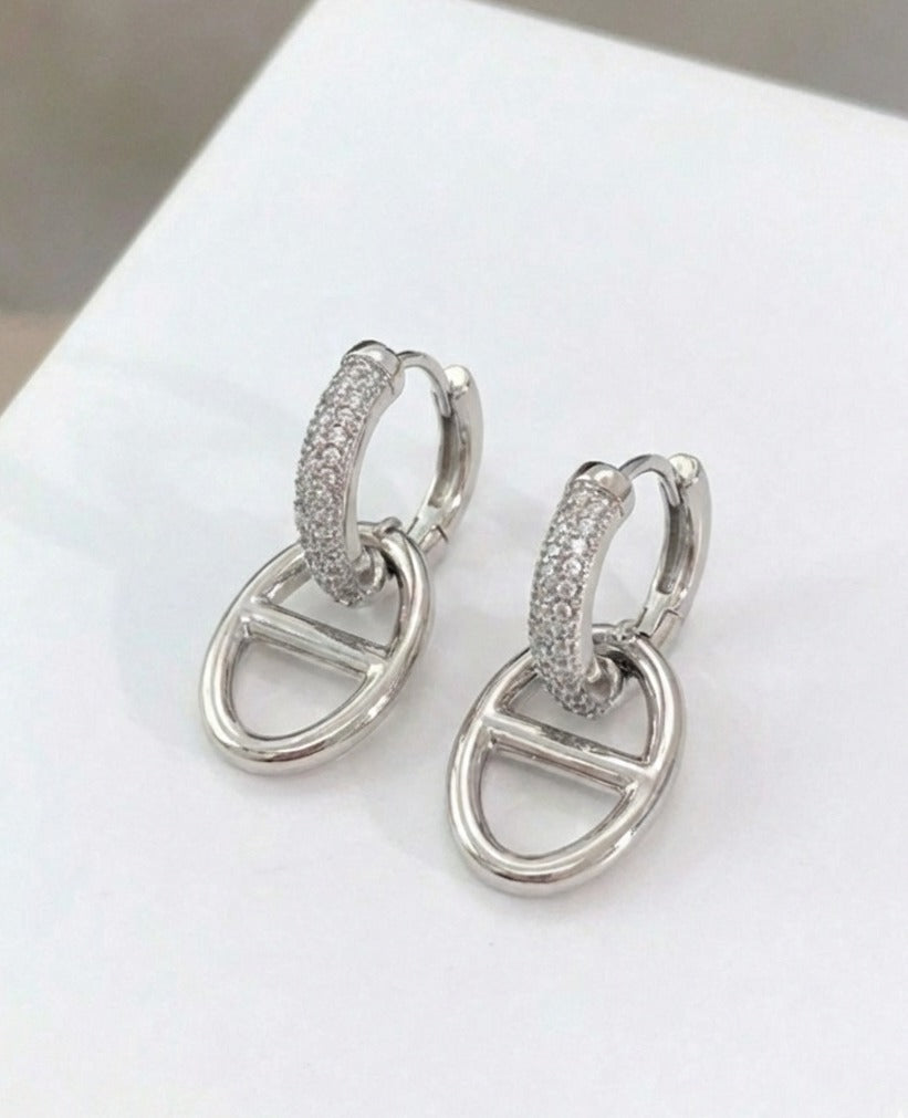 Silver pavé huggie drop earrings with polished anchor link detail