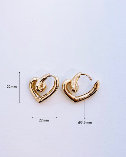 Gold heart knot earrings with size measurements 22mm x 22mm, 3.5mm thickness reference