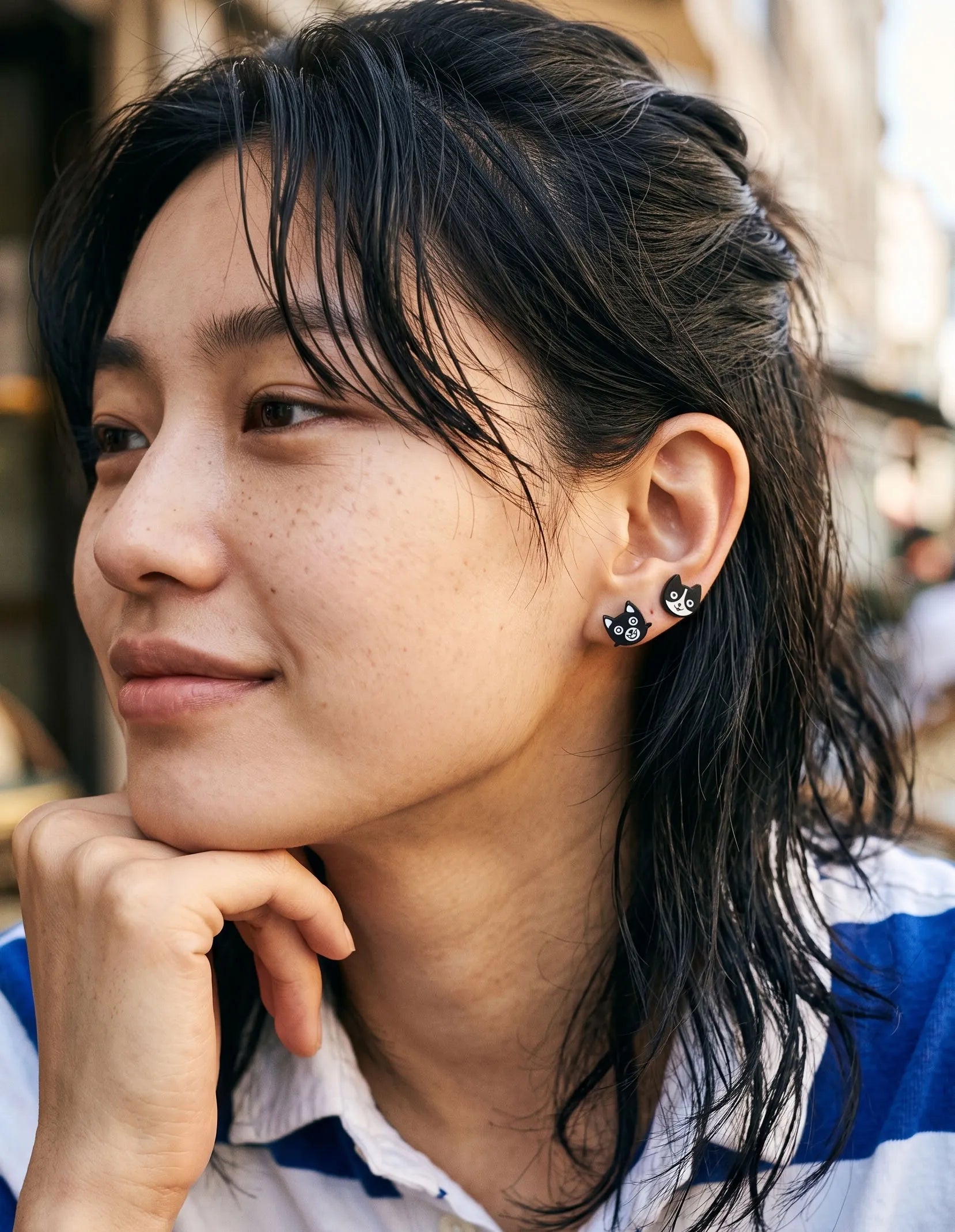 Black cat and white cat enamel stud earrings layered on one ear — cat mom jewelry, K-style curated ear, mismatch studs handmade in Korea