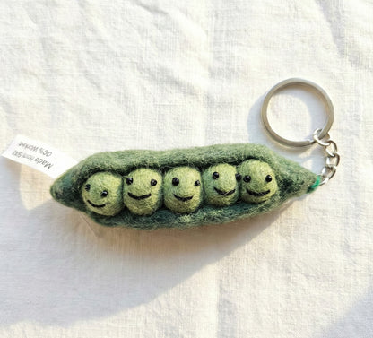 Five peas in a pod needle felt keychain with smiling faces
