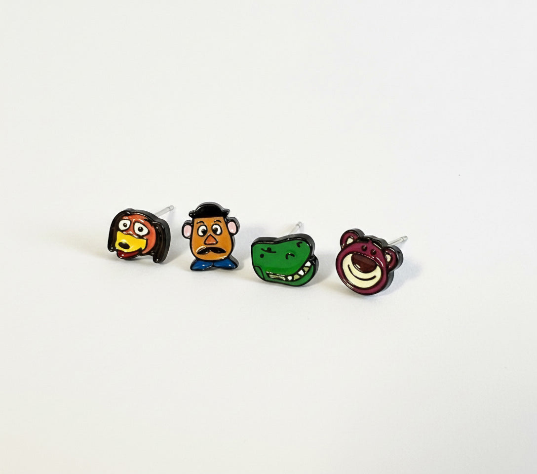 Type B set showing Slinky Dog Rex Potato Head Lotso character stud earrings closeup