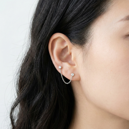 Silver surgical steel chain piercing earring on model