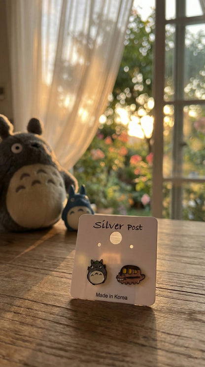 Totoro Catbus asymmetrical earrings on white card packaging with Silver Post label