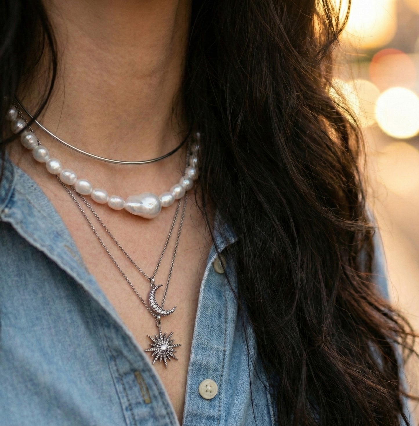 Silver brass wire choker with baroque pearls worn with denim chambray shirt
