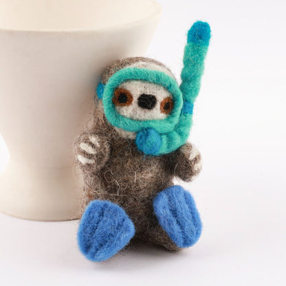Diving otter wool felt keychain with turquoise goggles and blue flippers handmade in Nepa