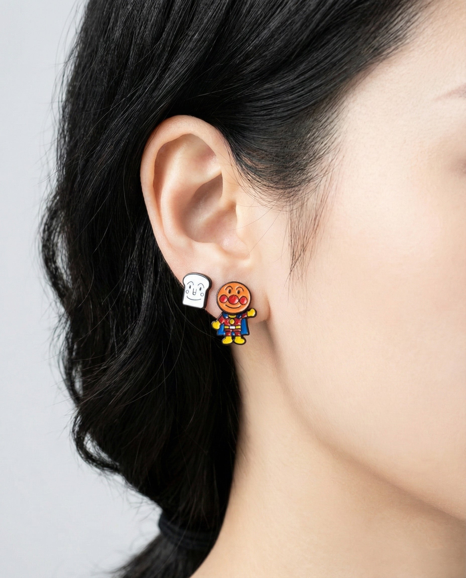 Anpanman and Shokupanman earrings stud mode on ear