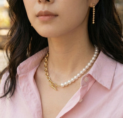  Half-and-half pearl and gold chain choker styled with blush pink button-down shirt