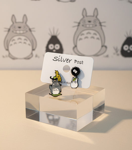orest spirit earring set display with grey Totoro, soot sprite, and white spirit on product card