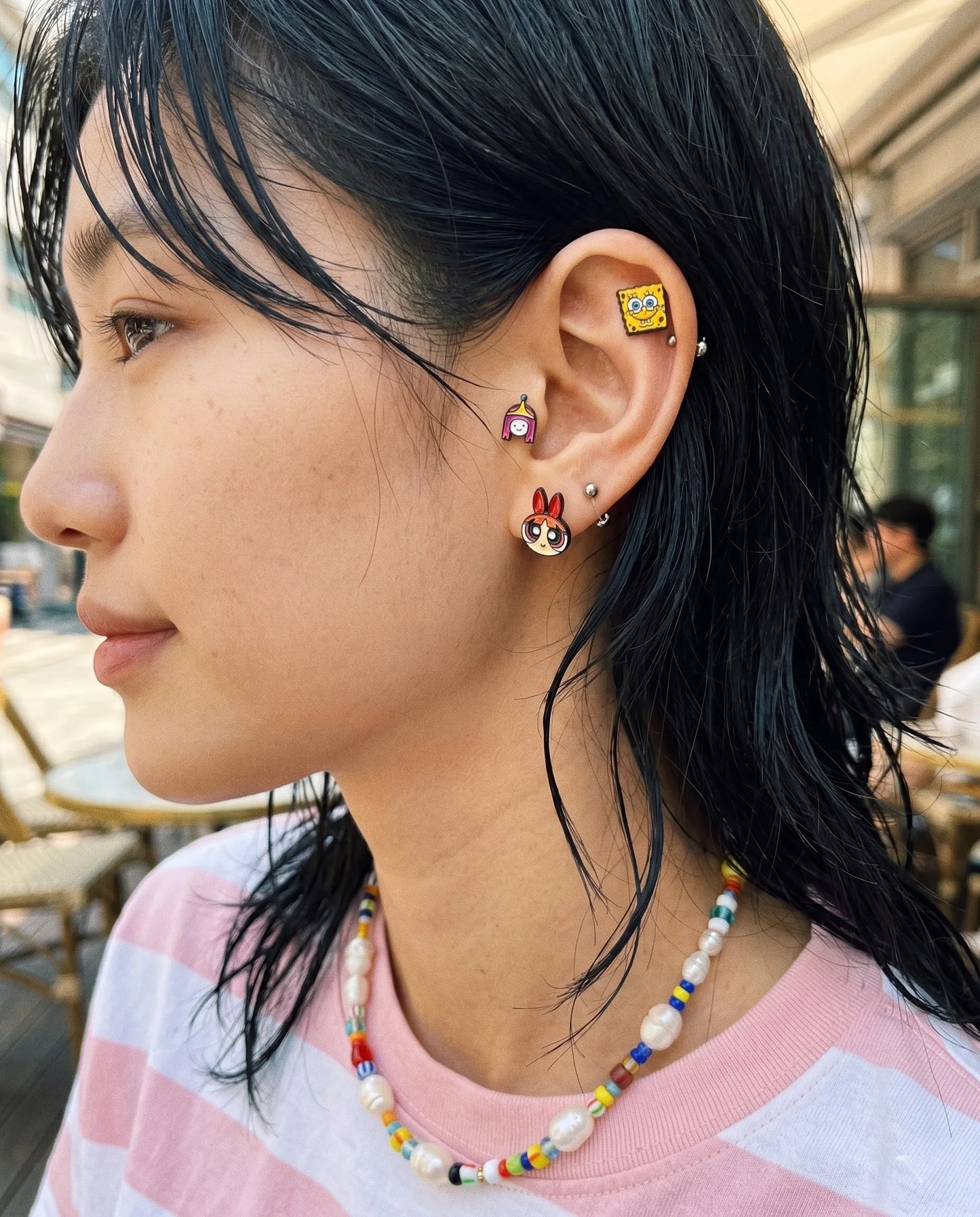 Curated ear stack inspo — 8ttitto8 character piercing set with pearl bead necklace, Y2K kidcore aesthetic multi-piercing look
