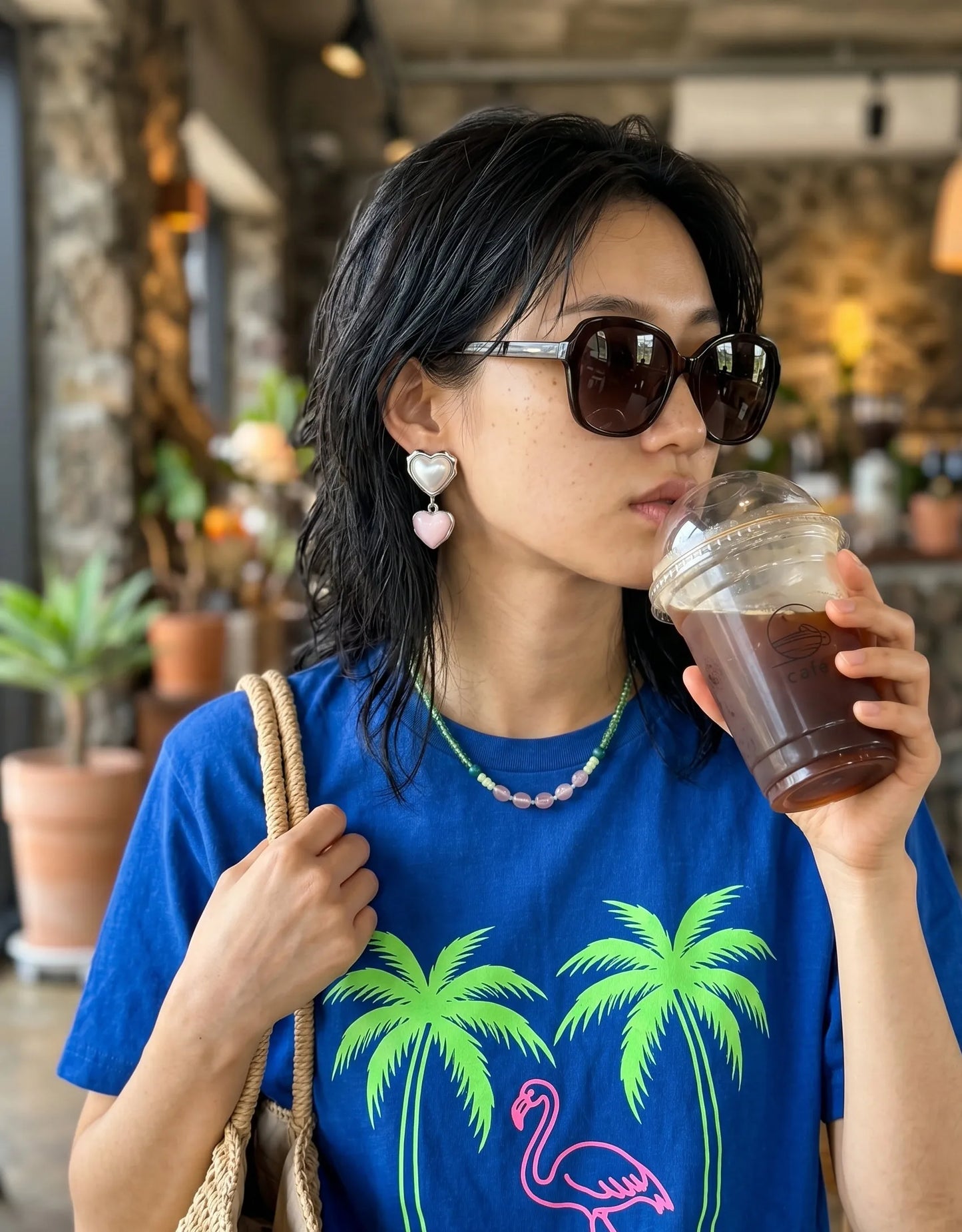 Pink heart drop earrings with oversized sunglasses, K-style jewelry for café outfit inspo.