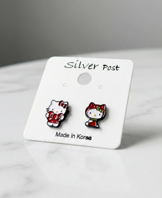 Handmade Hello Kitty strawberry earrings on white card with silver post label and Made in Korea text