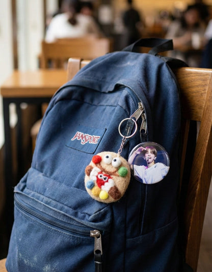 Cookie monster wool felt keychain on blue Jansport backpack with kpop photocard, bag decoration idea