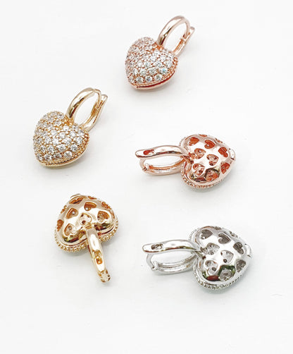 Pave cubic zirconia puffy heart huggie hoop earrings in gold silver and rose gold with hollow back design