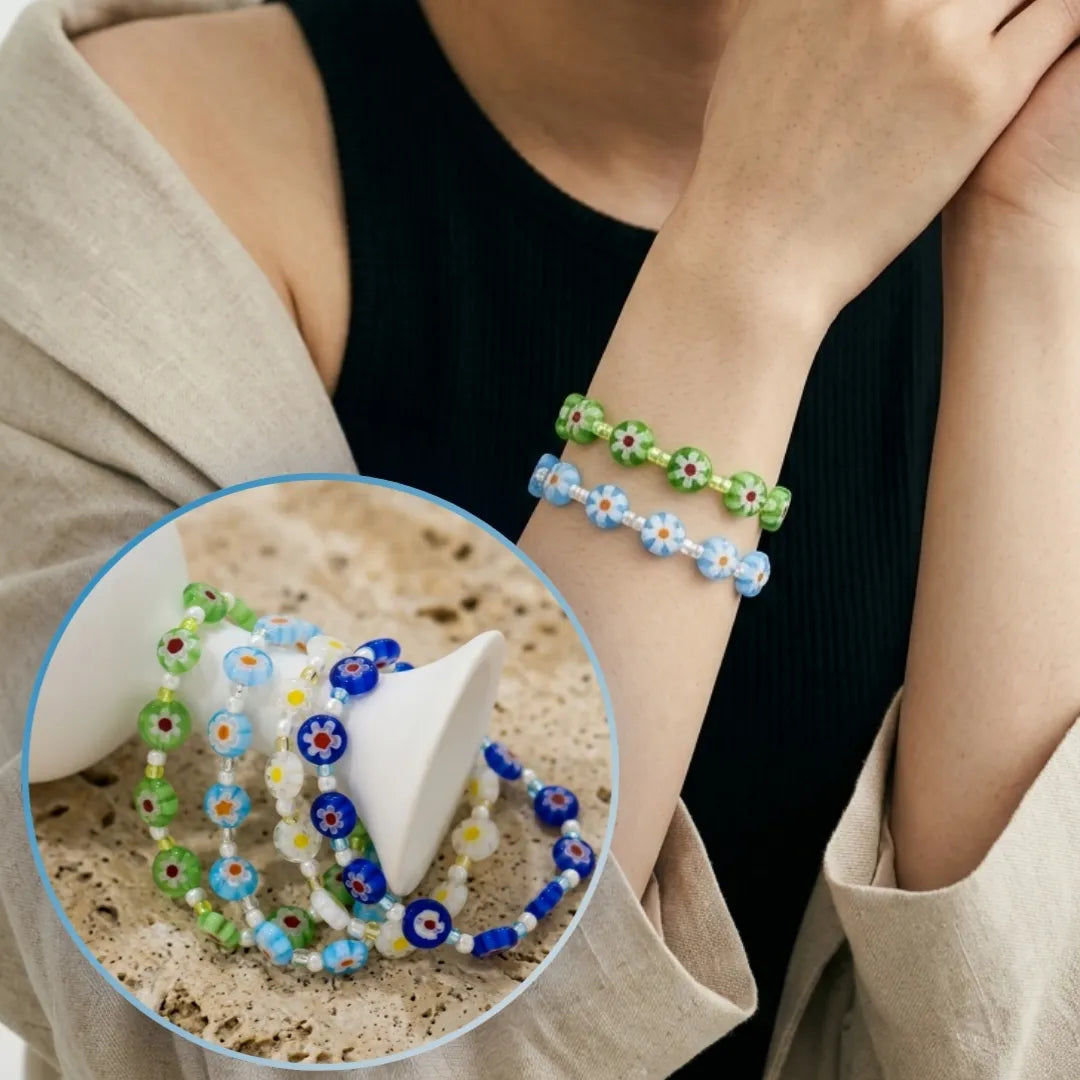 Stackable millefiori glass bead bracelets from 8ttitto8 featuring vibrant floral patterns, perfect for a layered summer jewelry look