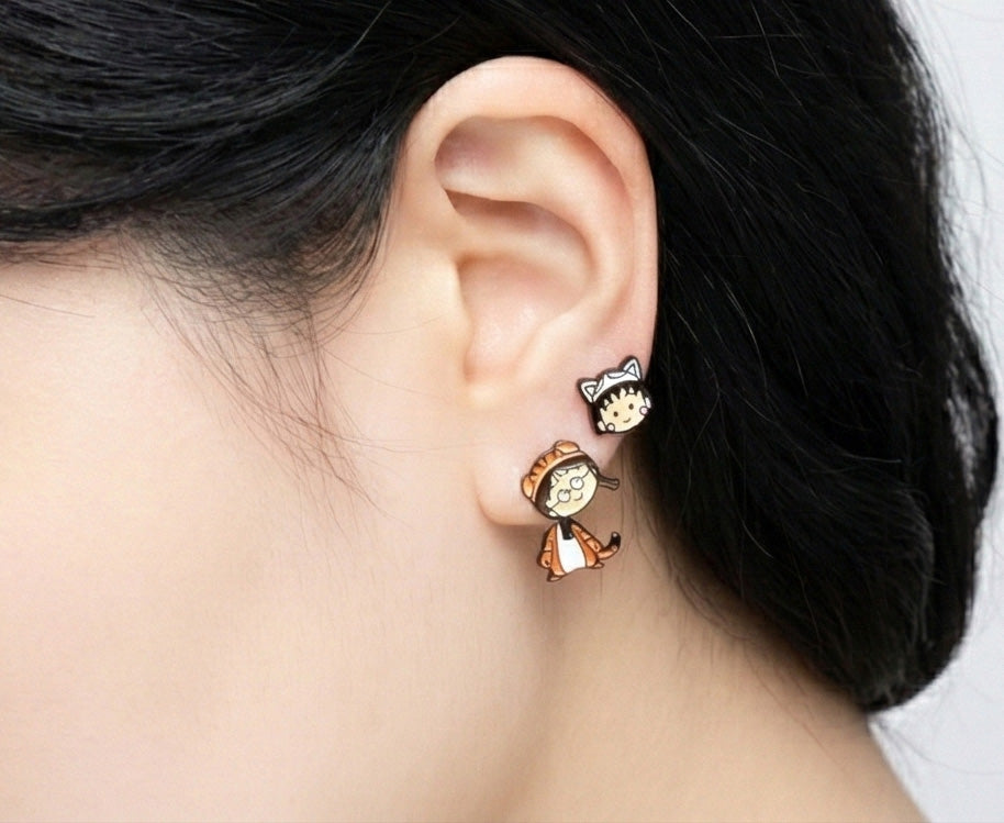 Ear styling demonstrating layered look with Maruko stud and Tamae drop earring