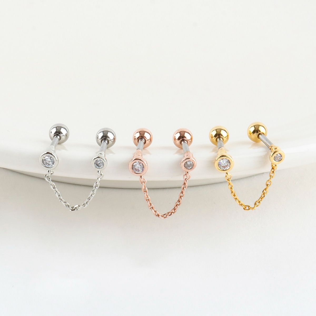 Cubic_zirconia_double_barbell_chain_earrings_in_silver_rose_gold_and_gold