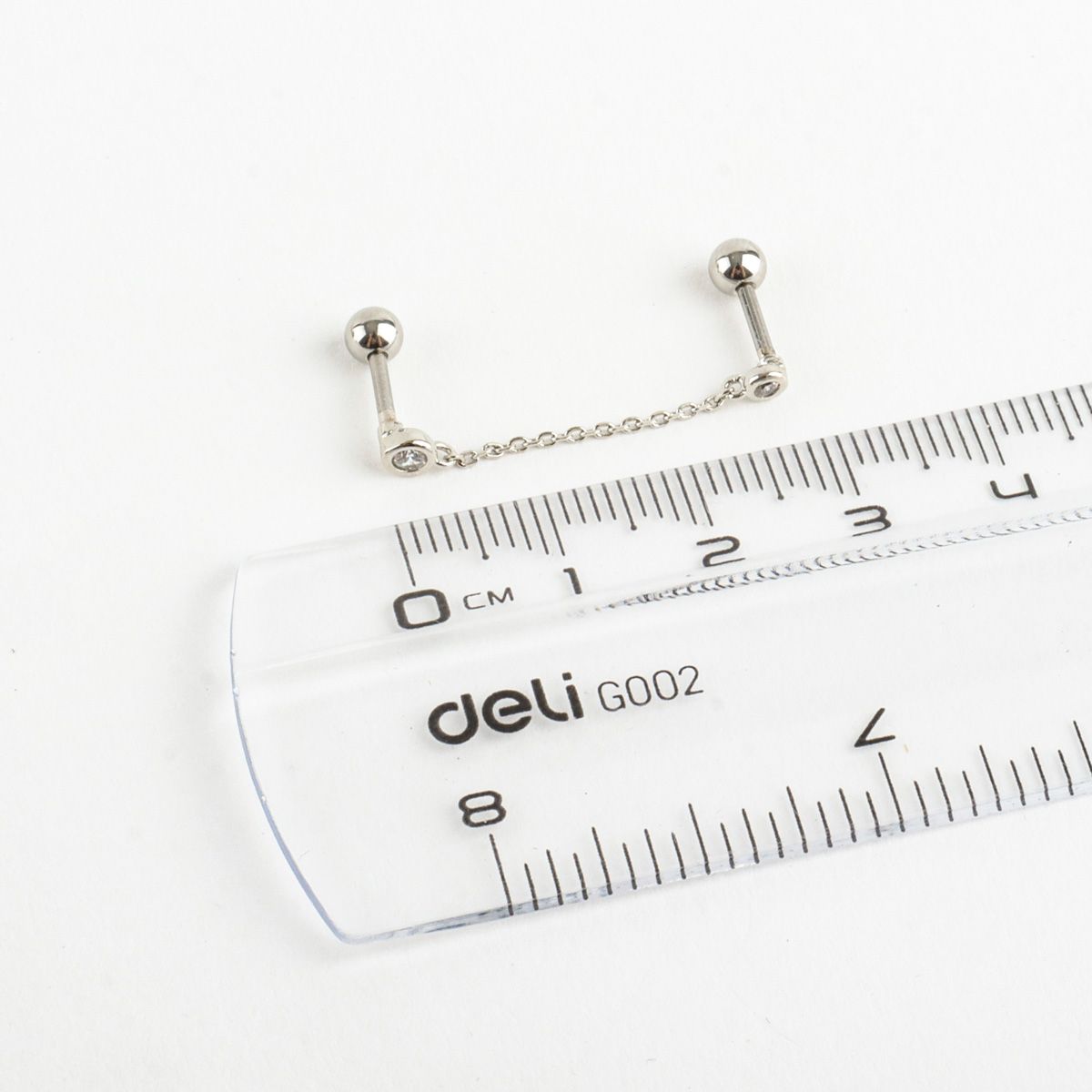 Double_barbell_chain_earring_size_measurement_with_ruler_showing_length