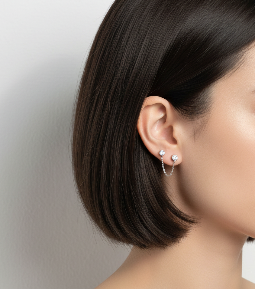Double_barbell_chain_earring_with_cubic_zirconia_on_ear