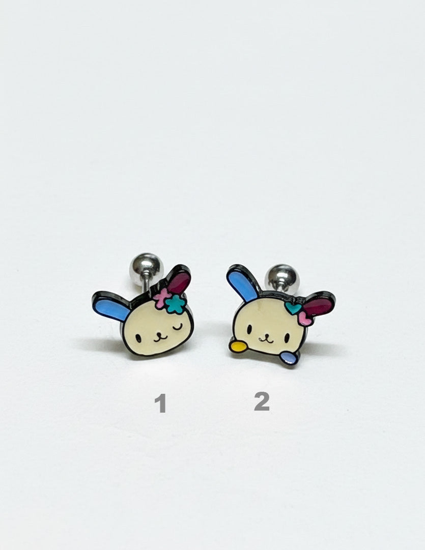 two Ussahana-inspired pastel bunny-face barbell stud earrings in surgical steel, numbered 1 and 2 on a white background
