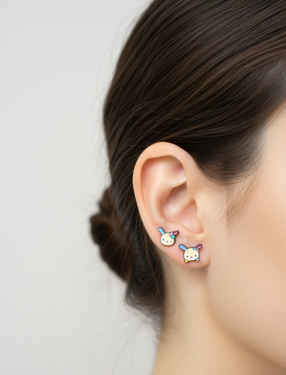 ear styling with two colorful bunny-face surgical steel barbell studs placed on the inner cartilage