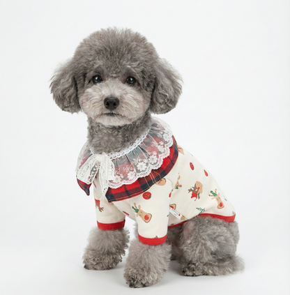 A gray poodle wearing a festive cream shirt with red trim and reindeer prints, styled with the red plaid Merry Happy Cape. Posed on a white background.