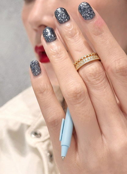 Minimalist stacking rings on hand